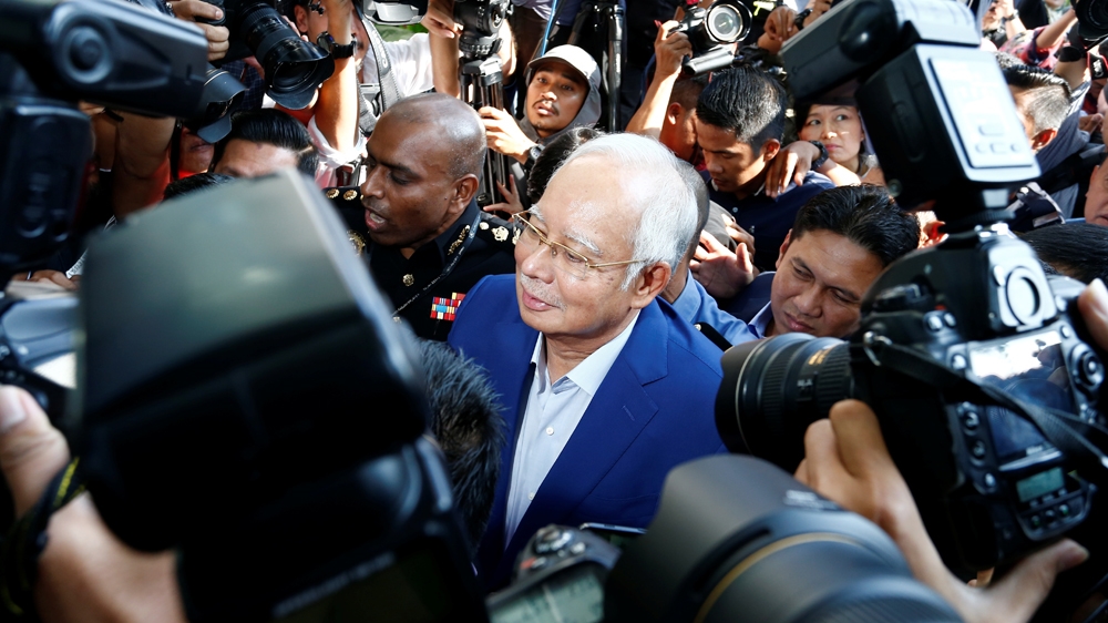 Malaysia’s ex-PM Najib wondered over 1MDB scandal